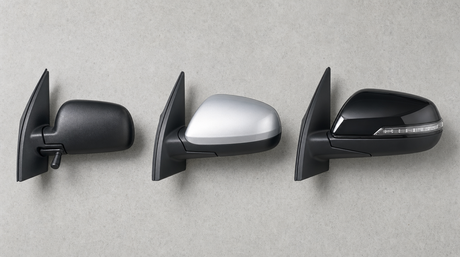 Three exterior car door mirrors side by side, manual, powered and modern with indicator - wing mirror vs side mirror vs rear-view mirror explained